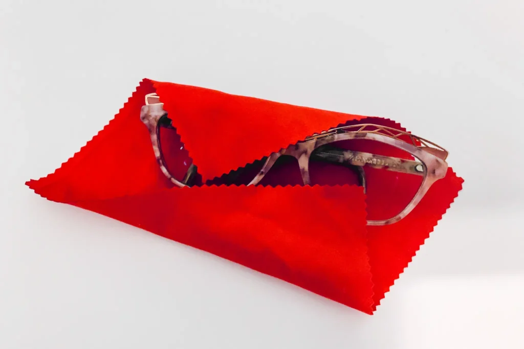 Portable eyewear maintenance kit with lens cleaner and microfiber cloth