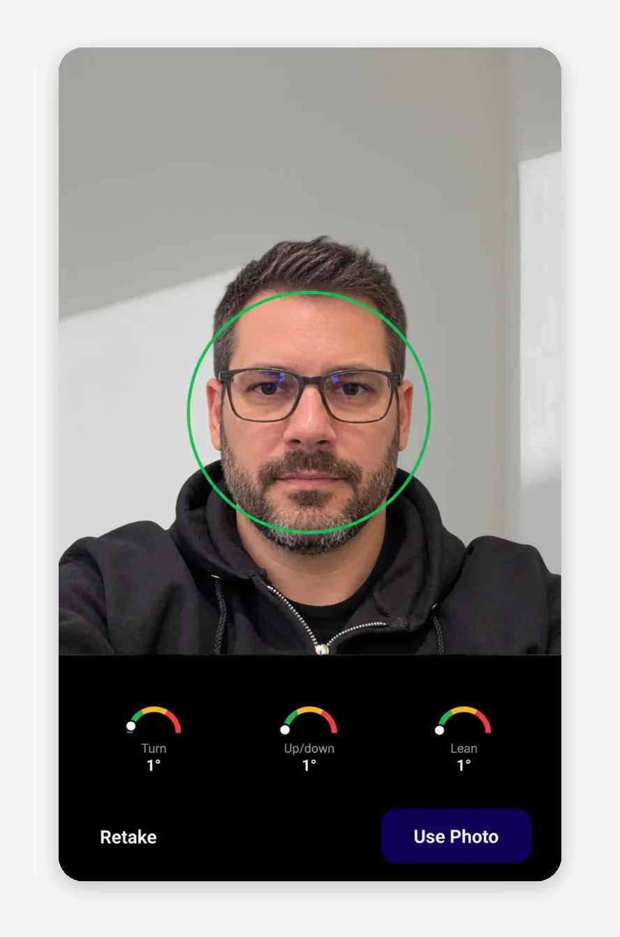 Optogrid app photo preview with Turn, Up/down and Lean gauges at 1 degree and Retake and Use Photo buttons